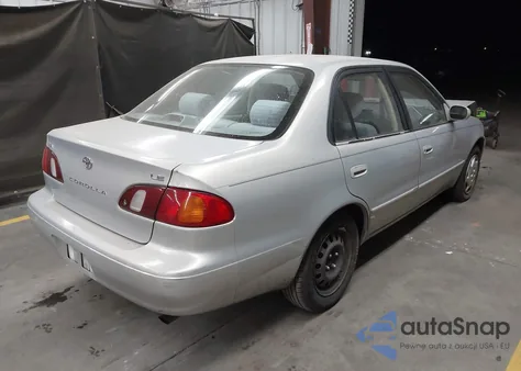 1999 Toyota Corolla Le from USA, damaged, VIN 2T1BR12E6XC172966